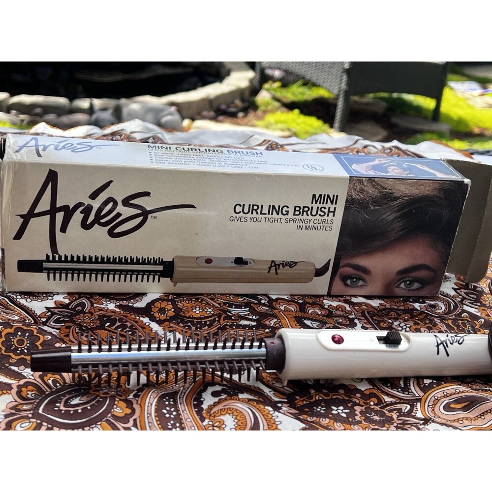 vintage Aries curling brush is a collectible beauty styling tool - 1970’s